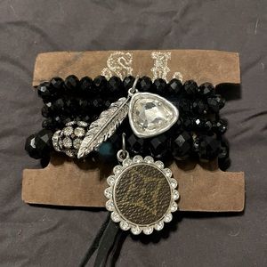 UPCYCLED stacker bracelet with charm from
Sandra Lang jewelry